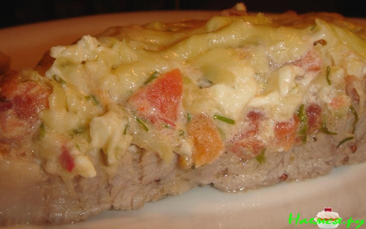 Отбивная под сочной овощной щубкой