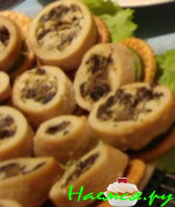 Канапе из фаршированных кальмаров Канапе из фаршированных кальмаров