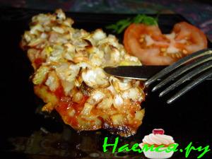 Рыба, запеченная с чесноком и луком